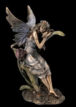 Elfen Figur Lehnt An Tulpe